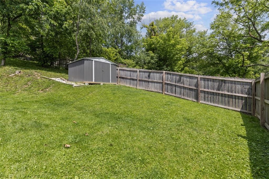 108 W Road Pittsburgh, PA 15209 - Photo 44 of 50 a backyard of a house with lots of green space