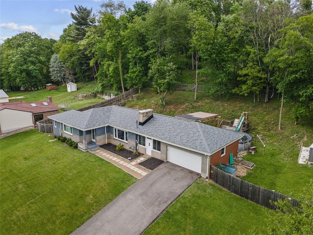 108 W Road Pittsburgh, PA 15209 - Photo 50 of 50 an aerial view of a house with swimming pool and a yard