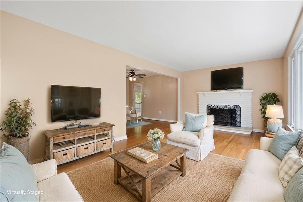 108 W Road Pittsburgh, PA 15209 - Photo 7 of 50 a living room with furniture and a flat screen tv