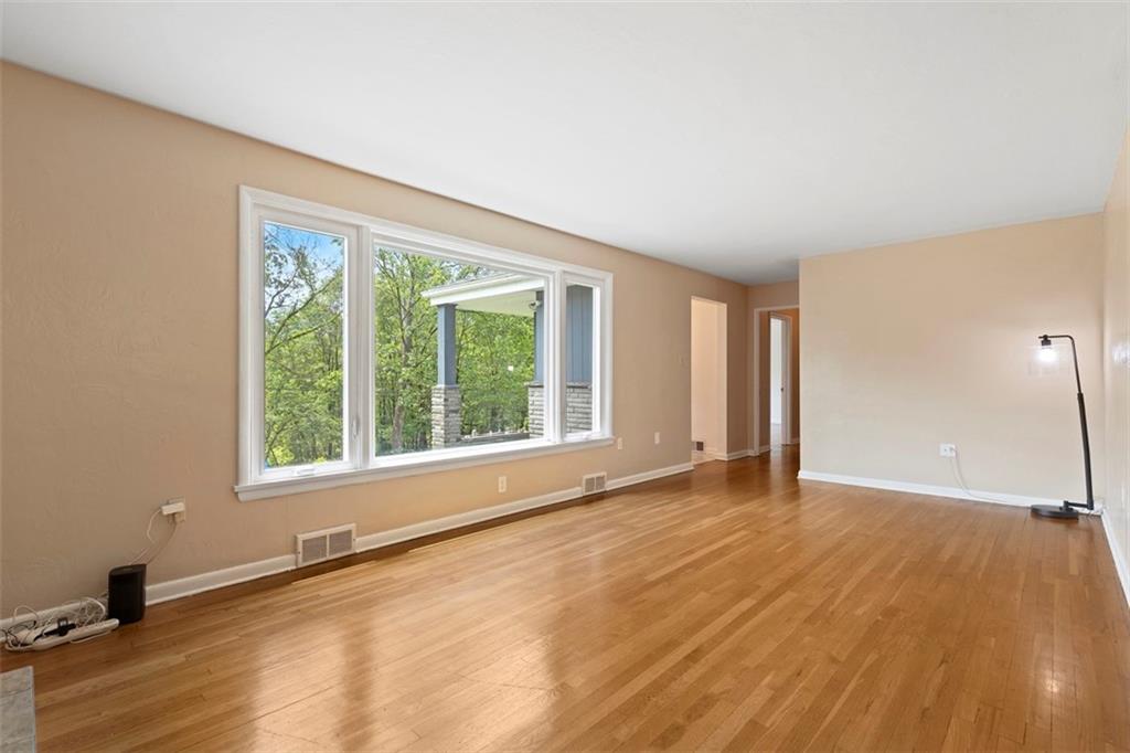 108 W Road Pittsburgh, PA 15209 - Photo 8 of 50 a view of an empty room with a window
