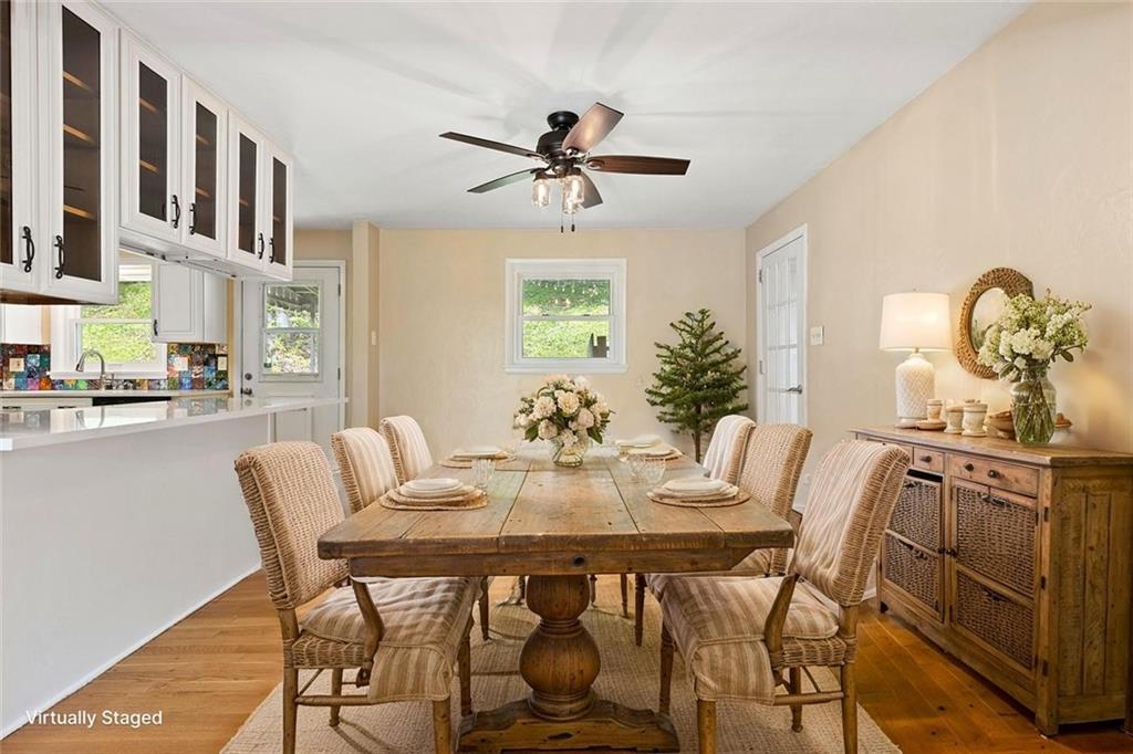 108 W Road Pittsburgh, PA 15209 - Photo 9 of 50 a view of a dining room with furniture and a chandelier