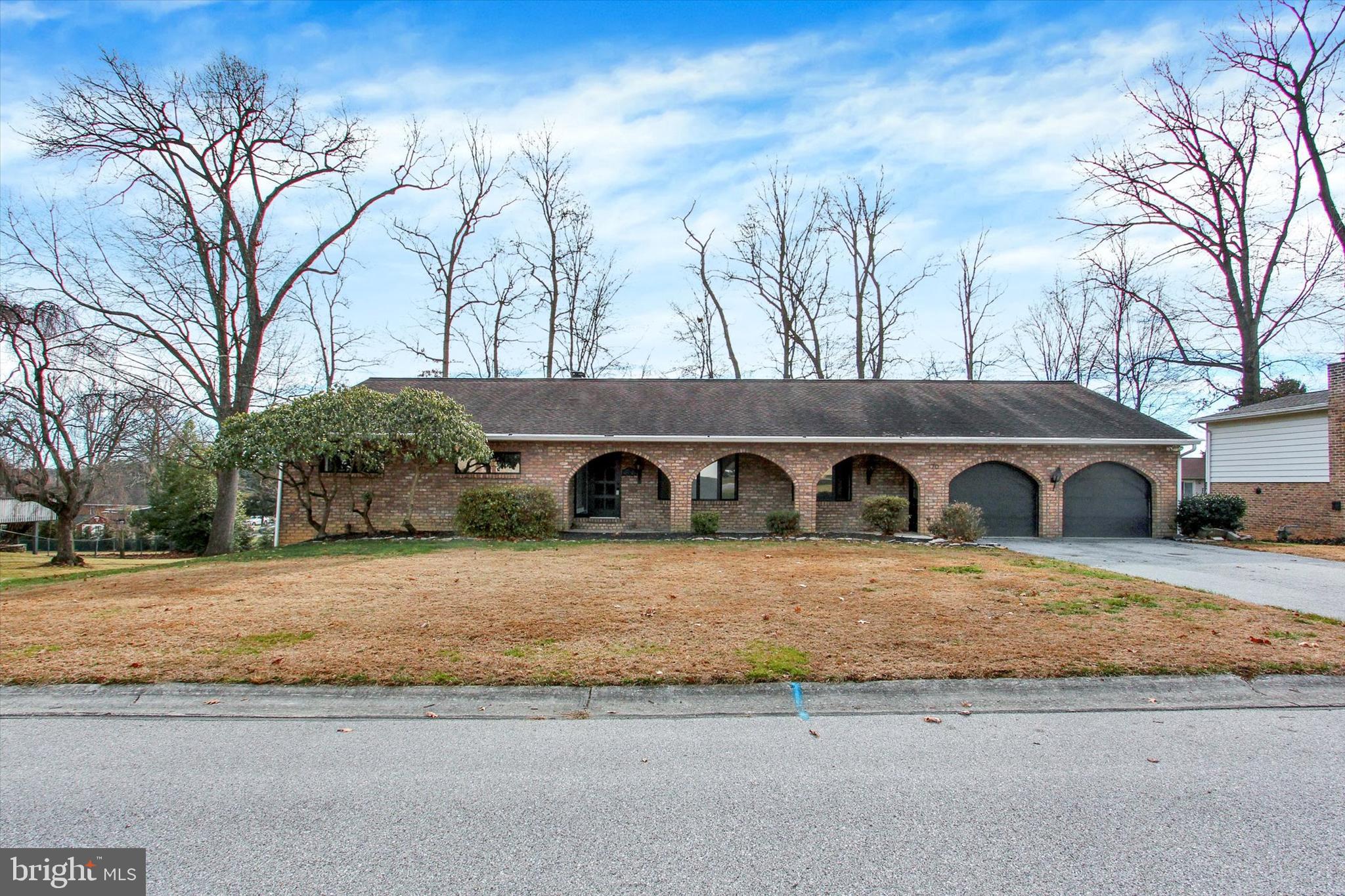 70 Laurel Drive Hanover, PA 17331 - Photo 1 of 48 a front view of a house with yard and trees