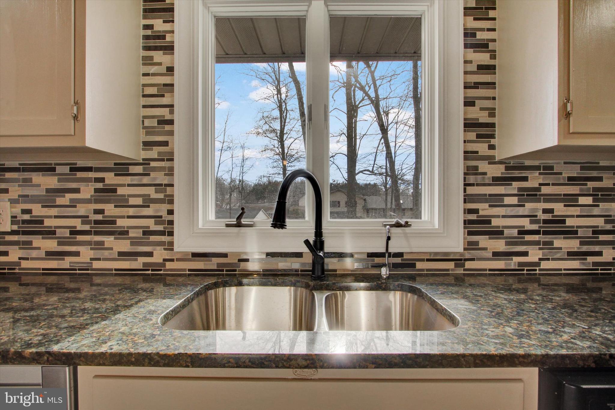 70 Laurel Drive Hanover, PA 17331 - Photo 13 of 48 a sink with a granite countertop sink and a window