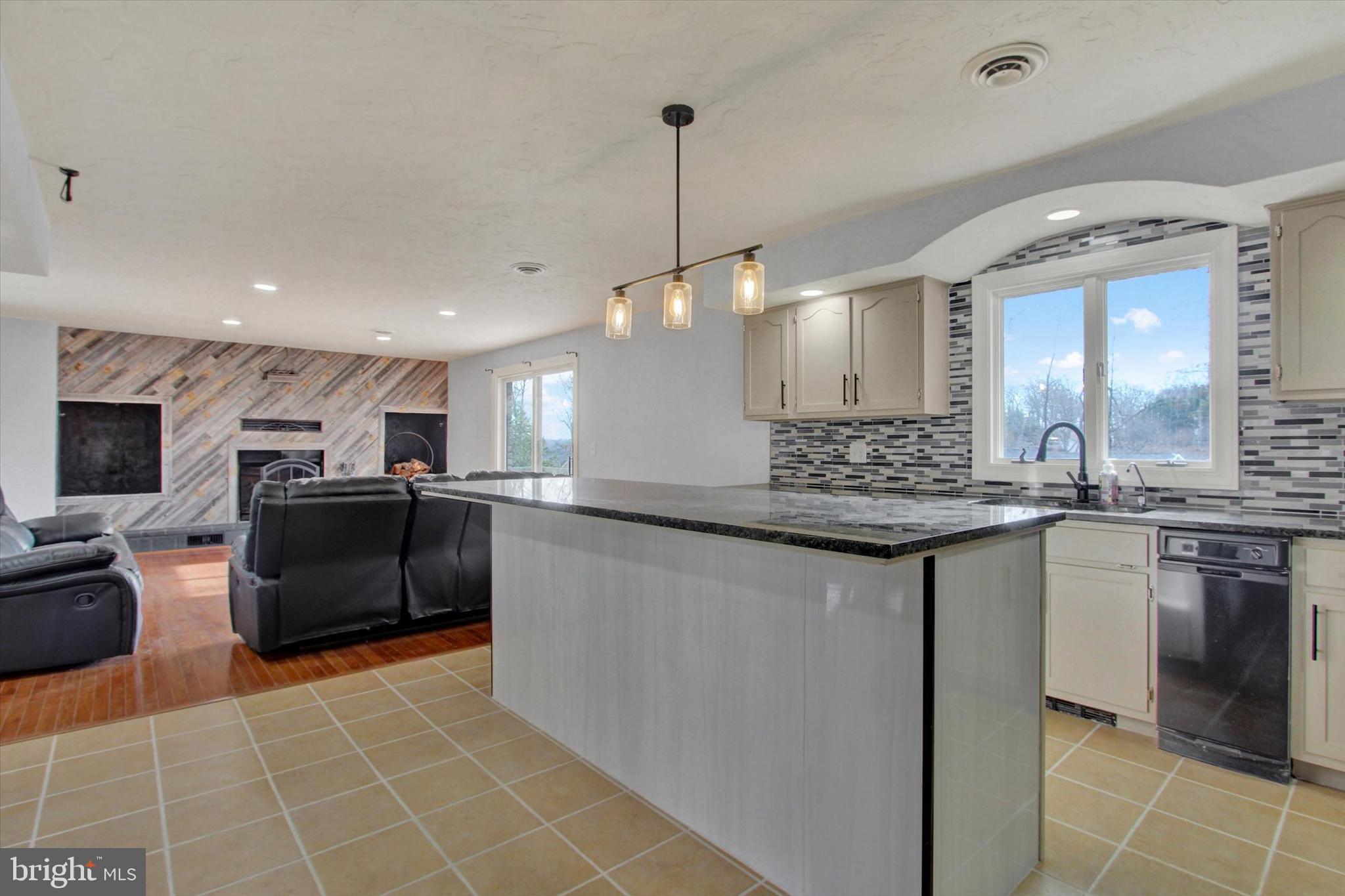 70 Laurel Drive Hanover, PA 17331 - Photo 15 of 48 a kitchen with stainless steel appliances granite countertop a sink counter space cabinets and a counter top space