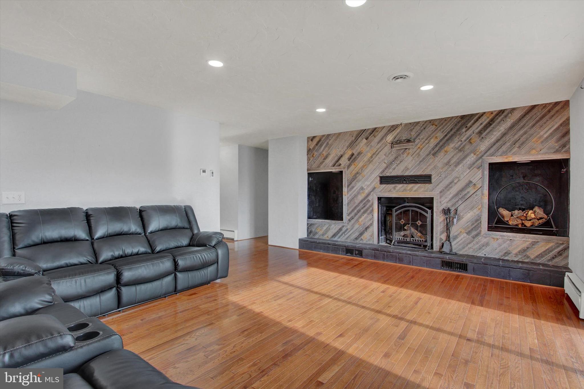 70 Laurel Drive Hanover, PA 17331 - Photo 19 of 48 a living room with furniture and a fireplace