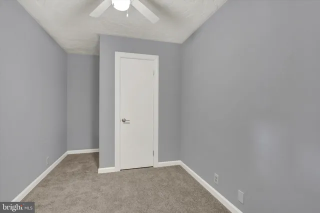 a view of an entryway with a tv