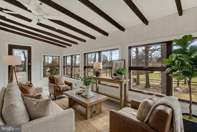 a bathroom with a sink a mirror and vanity