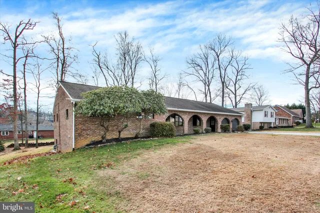 a picture of a bathroom with a shower