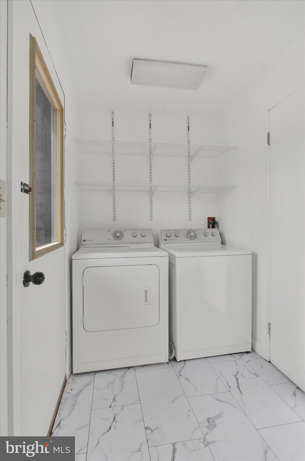 70 Laurel Drive Hanover, PA 17331 - Photo 32 of 48 a utility room with cabinets washer and dryer