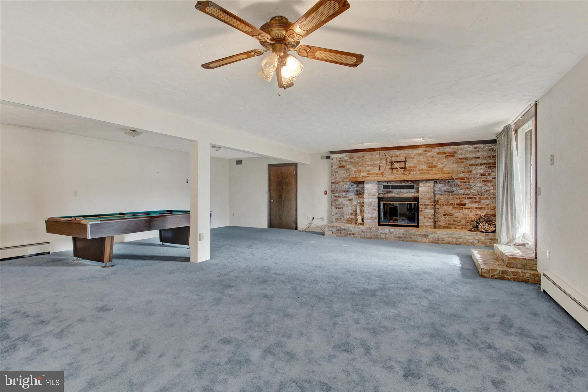 70 Laurel Drive Hanover, PA 17331 - Photo 35 of 48 a view of empty room with fireplace and fan