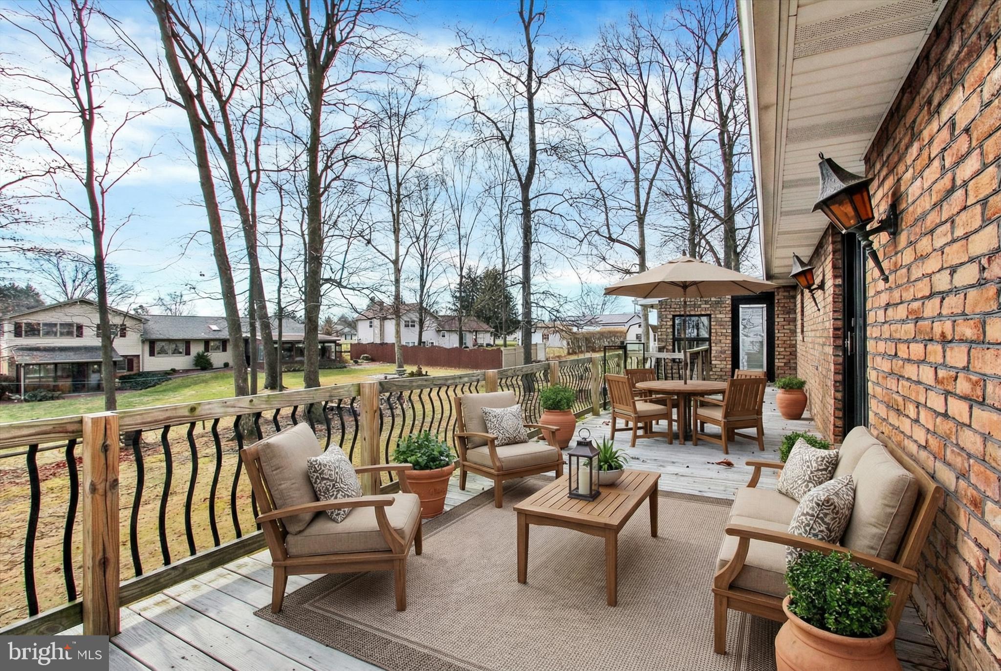 70 Laurel Drive Hanover, PA 17331 - Photo 41 of 48 a patio with hardwood table and chairs