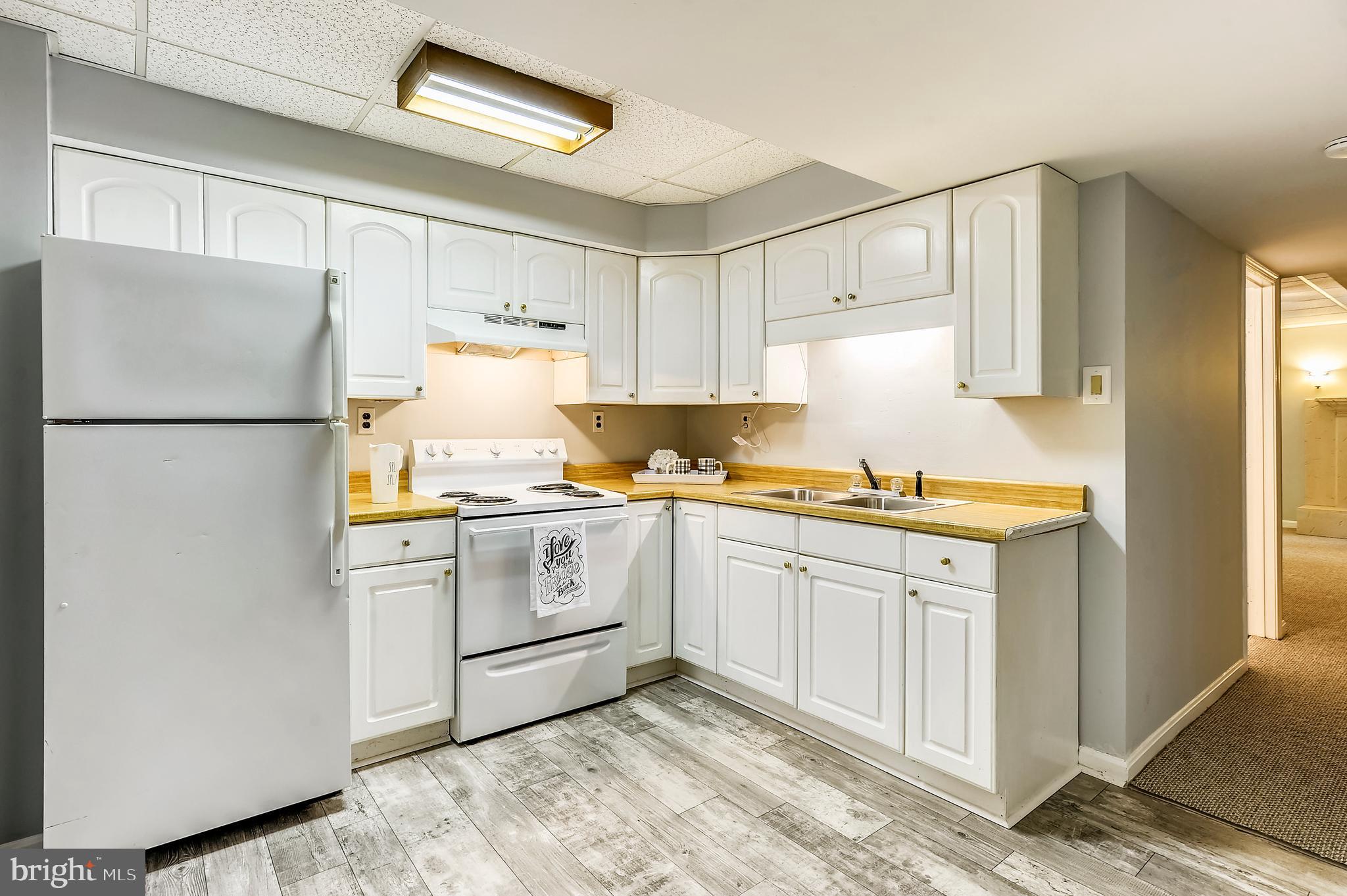 6755 Bensville Road Pomfret, MD 20675 - Photo 26 of 49 Lower level in-law suite kitchen