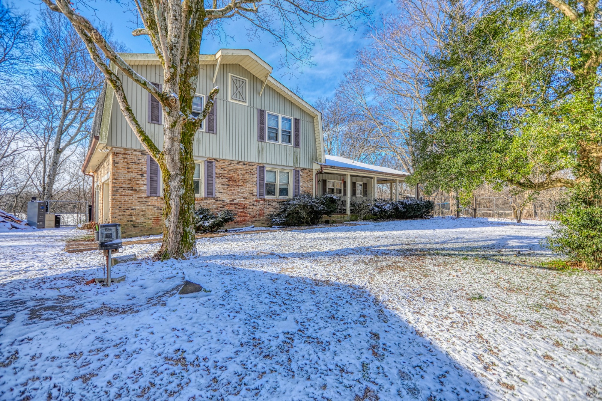 7707 Bob Carr Road Cross Plains, TN 37049 - Photo 1 of 49 a front view of a house with a yard