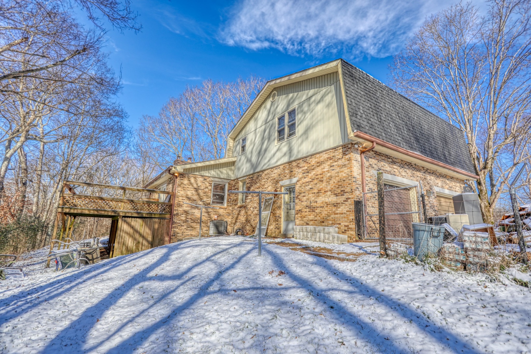 7707 Bob Carr Road Cross Plains, TN 37049 - Photo 19 of 49 a view of a house with a snow in the yard
