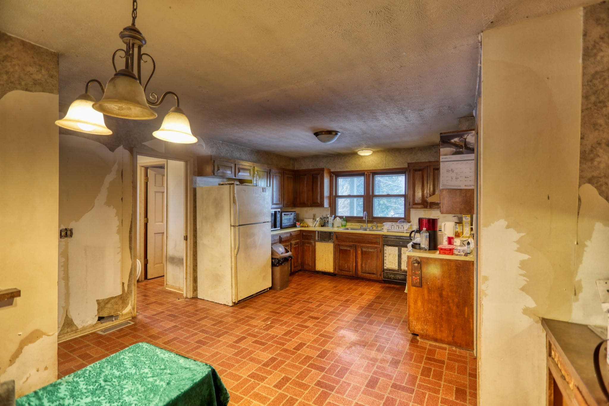 7707 Bob Carr Road Cross Plains, TN 37049 - Photo 26 of 49 a view of a kitchen with a sink and cabinets