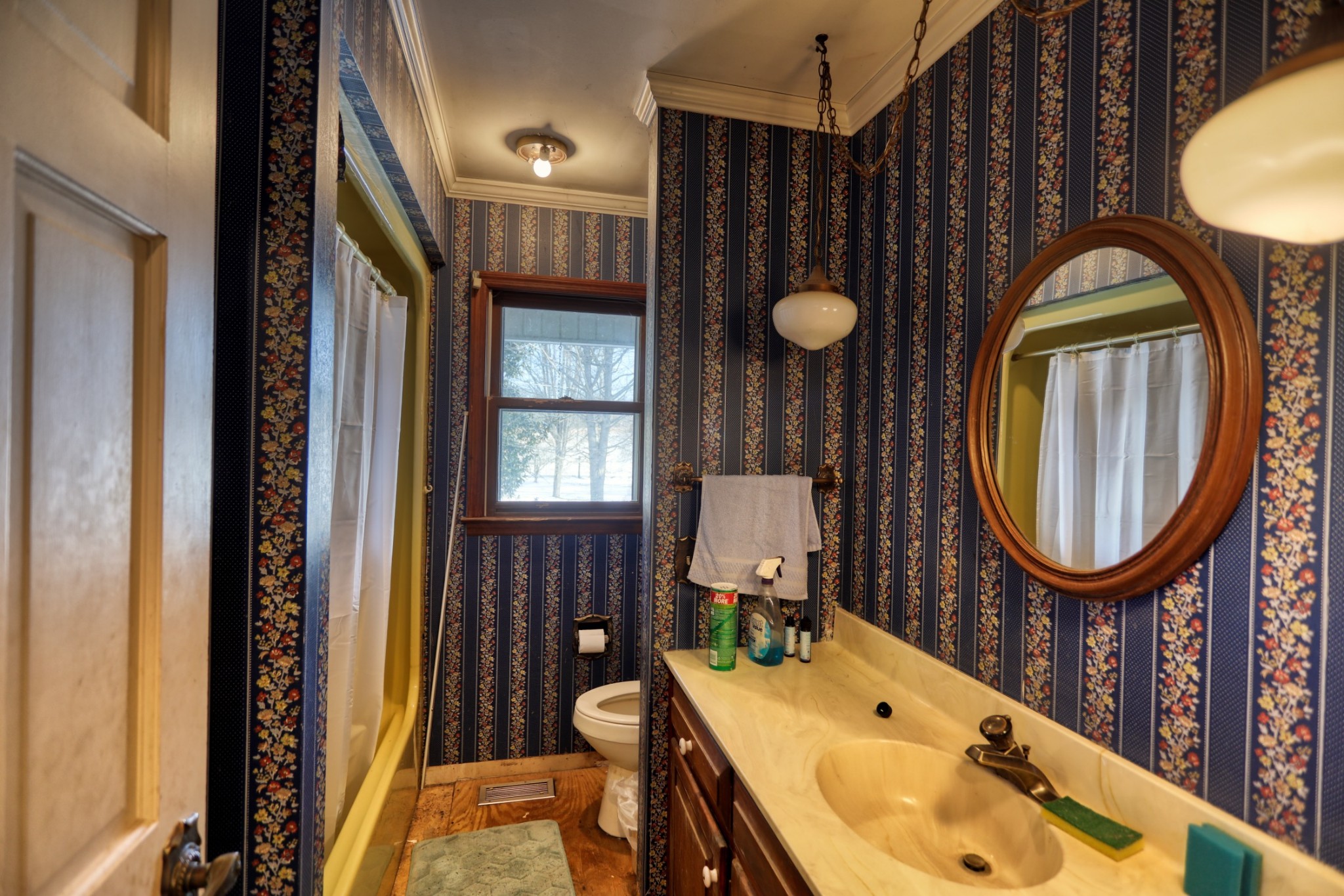 7707 Bob Carr Road Cross Plains, TN 37049 - Photo 28 of 49 a bathroom with a sink and a mirror