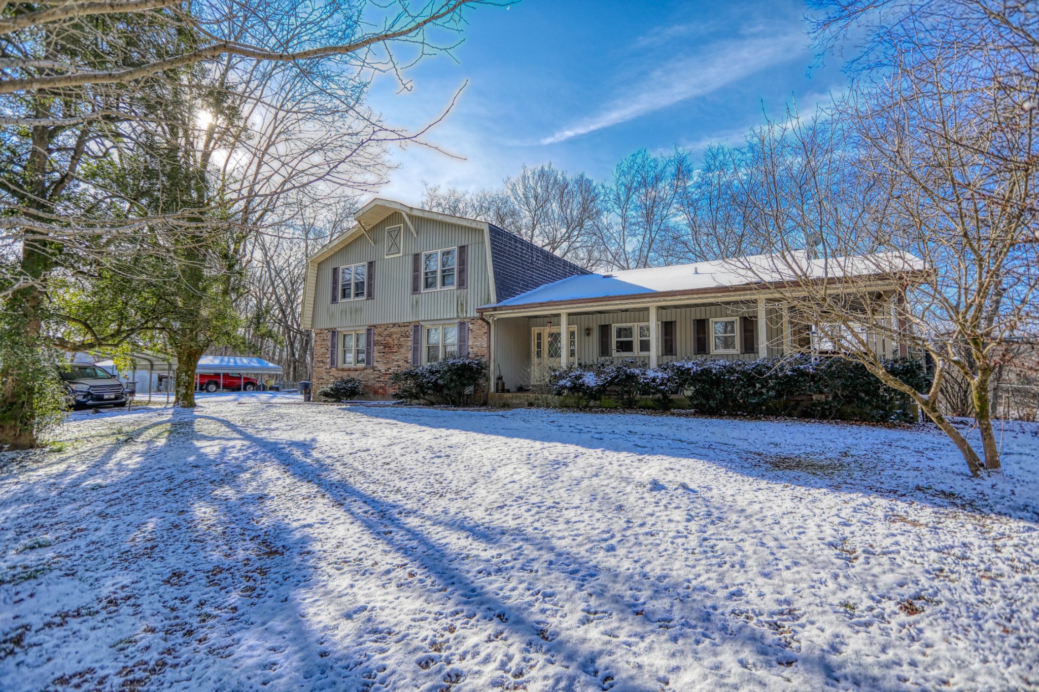 7707 Bob Carr Road Cross Plains, TN 37049 - Photo 5 of 49 a front view of a house with a yard