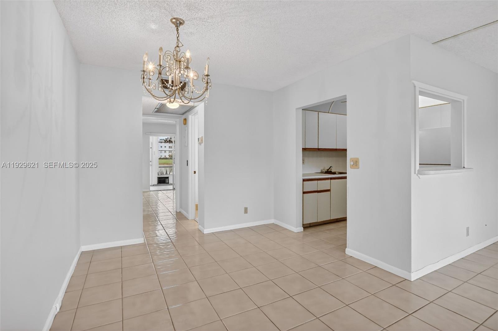 1008 Farnham North, Unit 1008 Deerfield Beach, FL 33442 - Photo 11 of 32 a view of a kitchen with an oven and cabinets