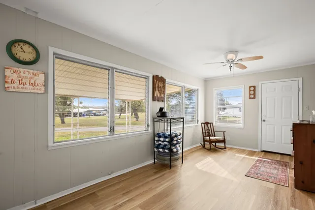 a view of workspace with furniture and window