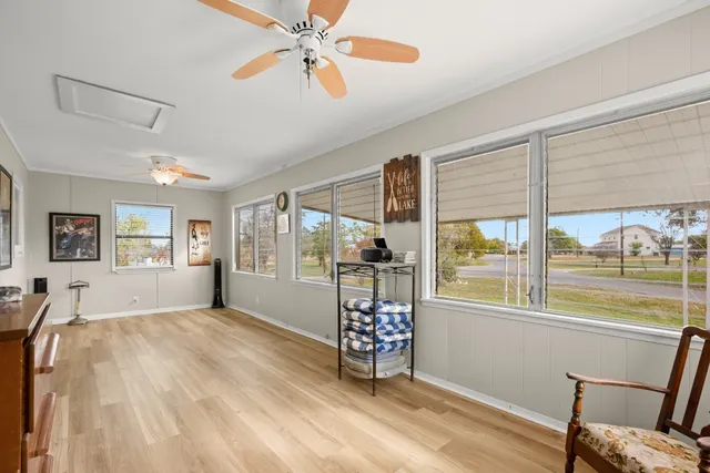 a bedroom with furniture and window