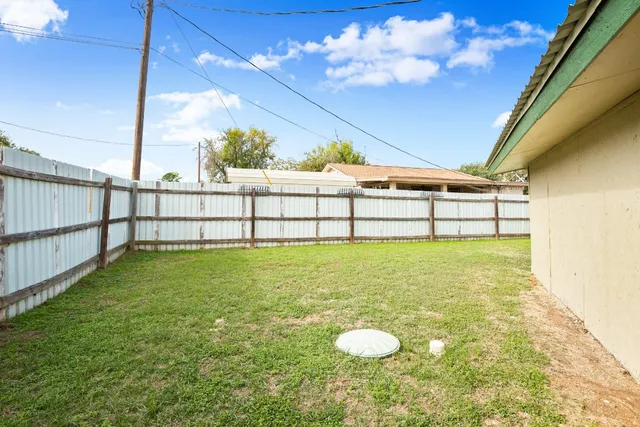 a view of outdoor space and yard