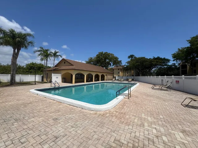 a view of a house with a swimming pool