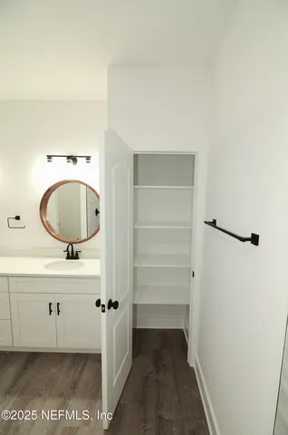 a bathroom with a toilet a sink and bathtub
