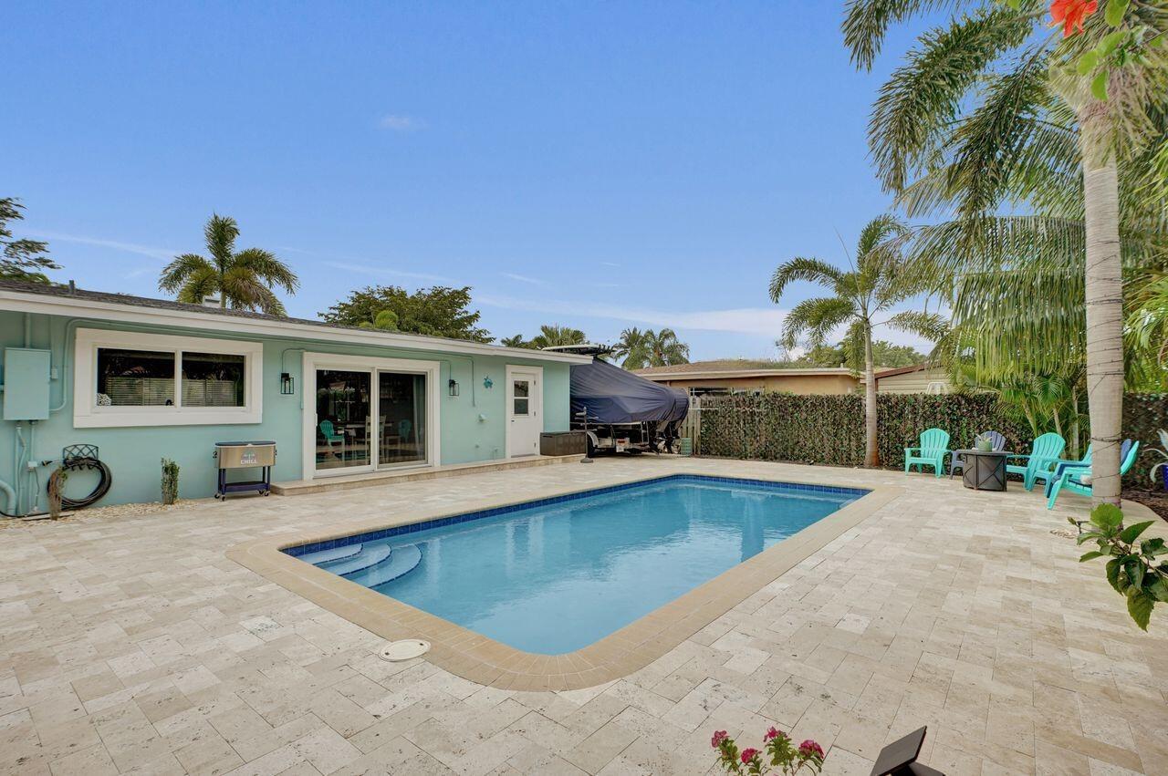 275 Southwest 14th Street Pompano Beach, FL 33060 - Photo 19 of 36 pool umbrella edited