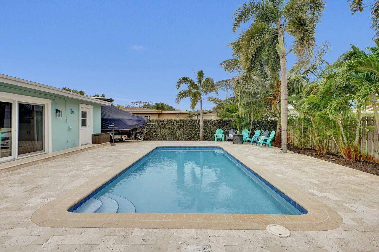 275 Southwest 14th Street Pompano Beach, FL 33060 - Photo 27 of 36 umbrella removeal