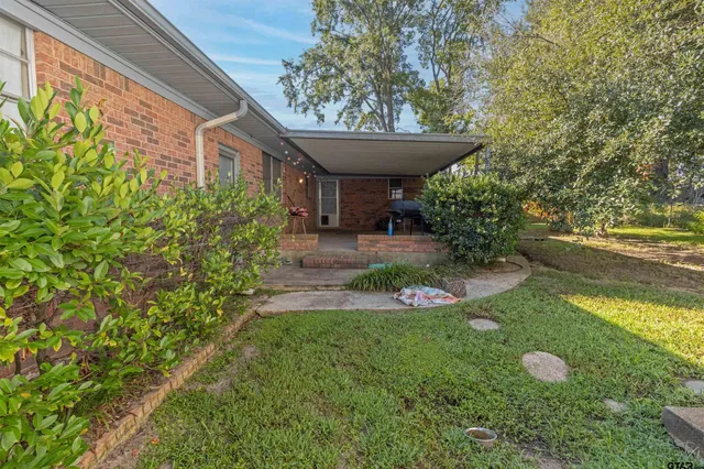 a garden view with a seating space