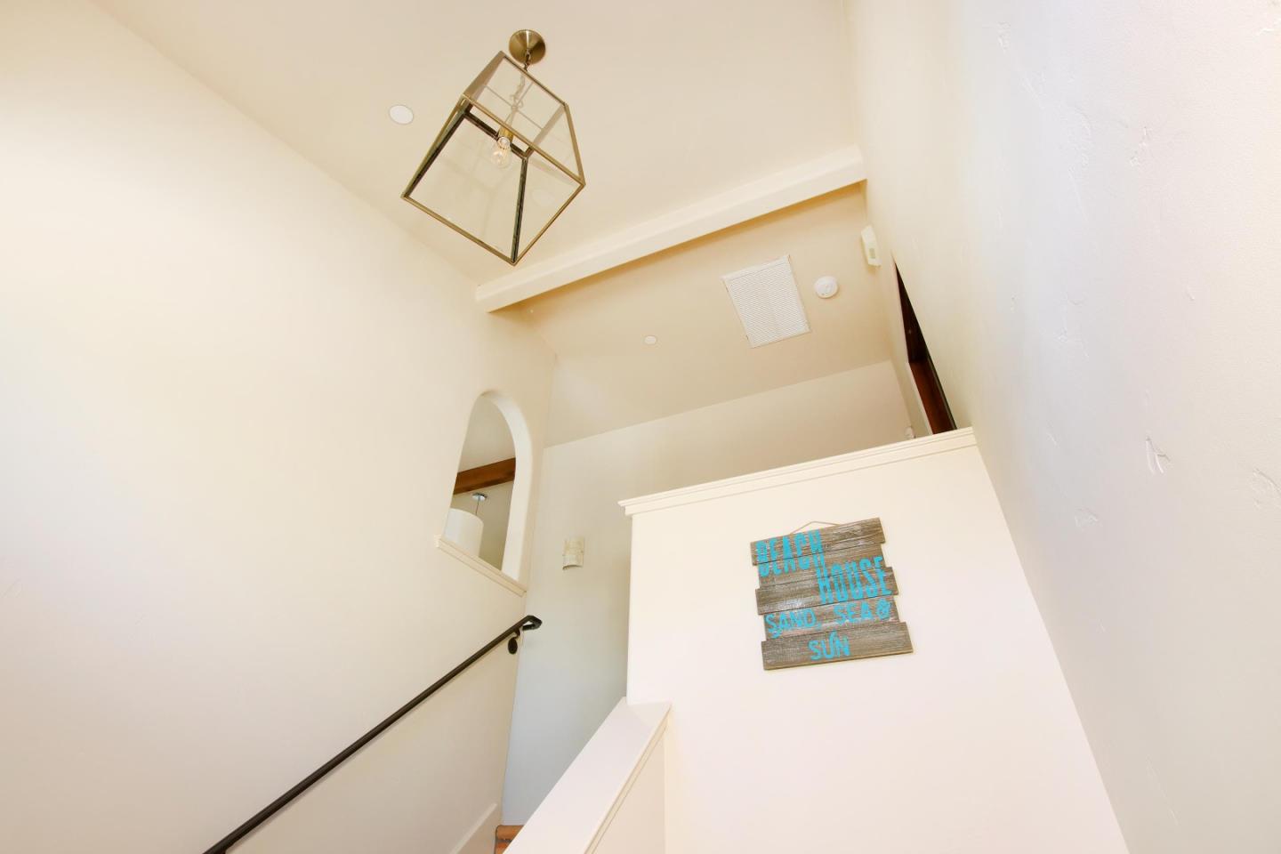 107 Beachgate Way Aptos, CA 95003 - Photo 39 of 95 a view of staircase with a white wall and white walls