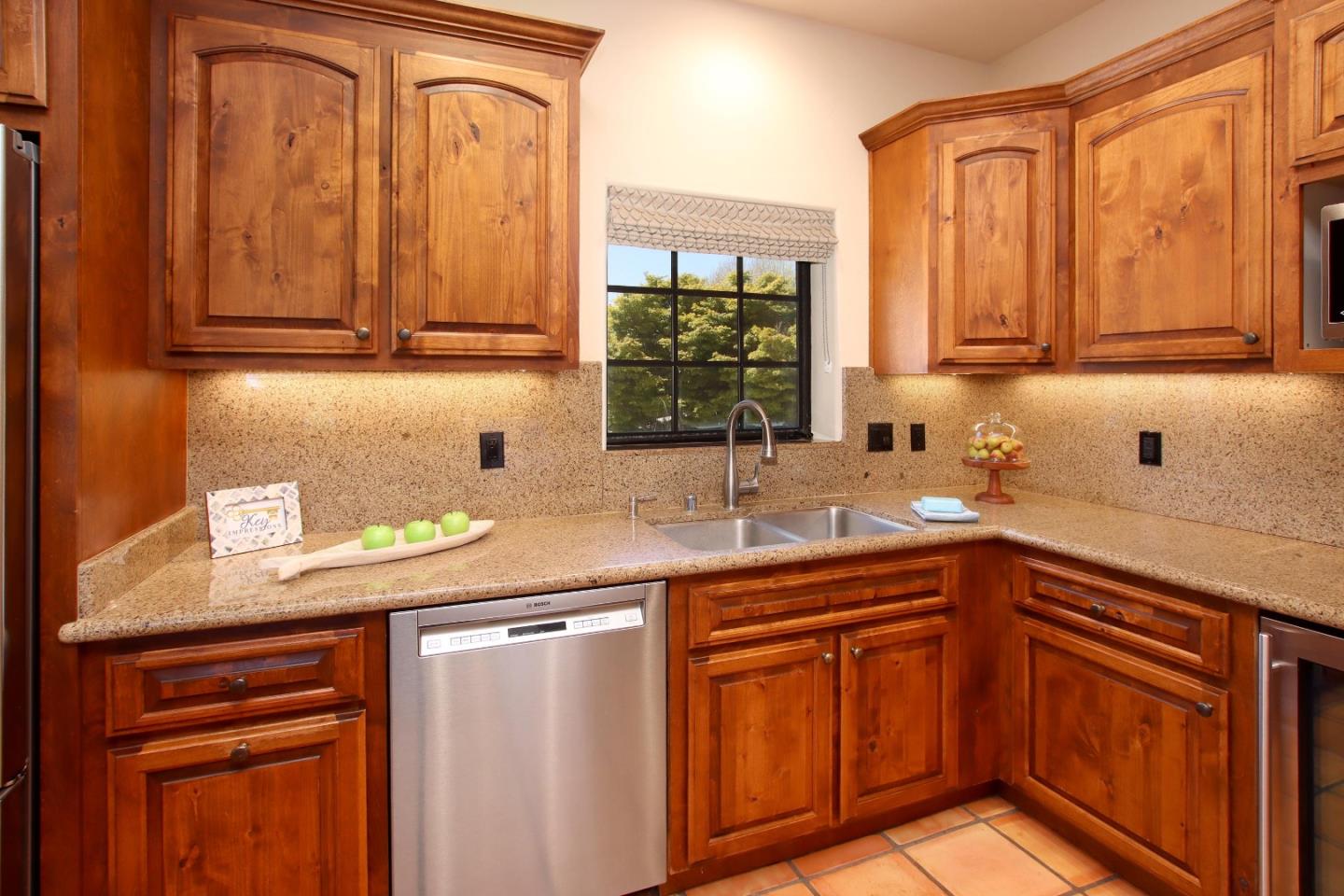 107 Beachgate Way Aptos, CA 95003 - Photo 41 of 95 a kitchen with stainless steel appliances granite countertop a sink and cabinets