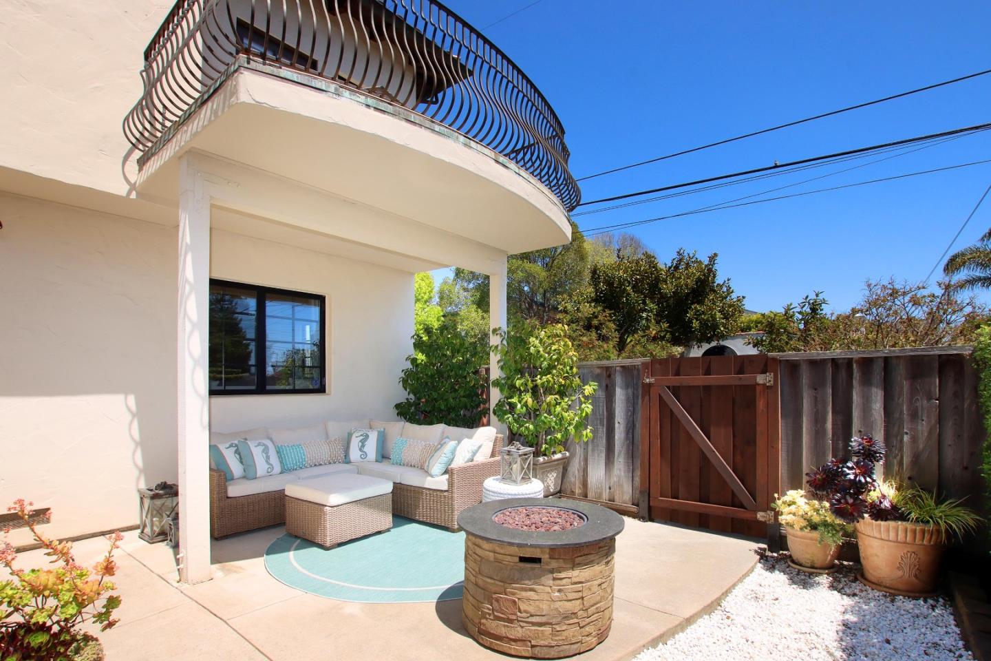 107 Beachgate Way Aptos, CA 95003 - Photo 48 of 95 a view of a patio with couches and potted plants