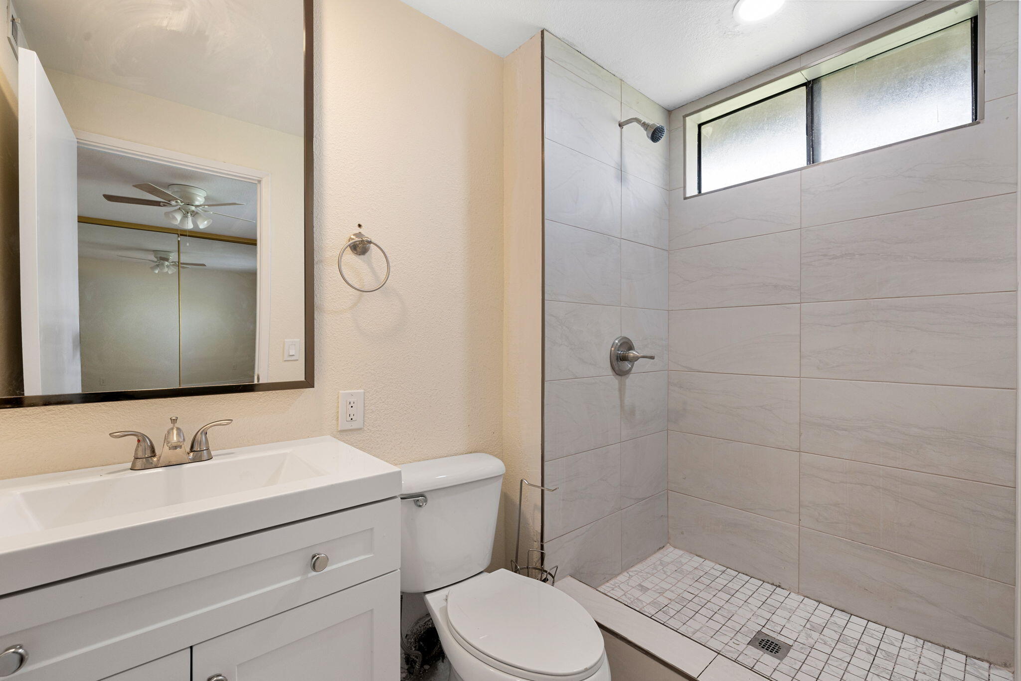 41885 Largo Palm Desert, CA 92211 - Photo 15 of 26 a bathroom with a sink a toilet and shower