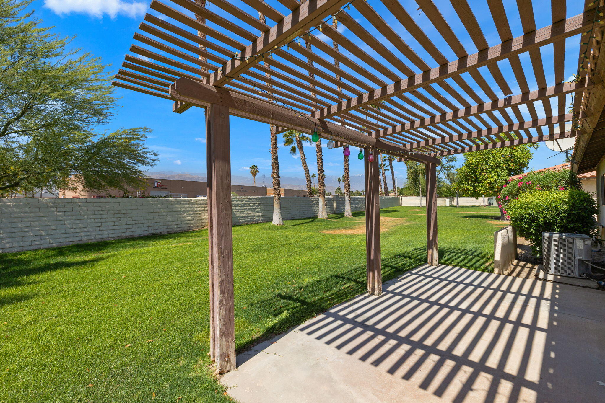 41885 Largo Palm Desert, CA 92211 - Photo 18 of 26 a view of a porch with a backyard