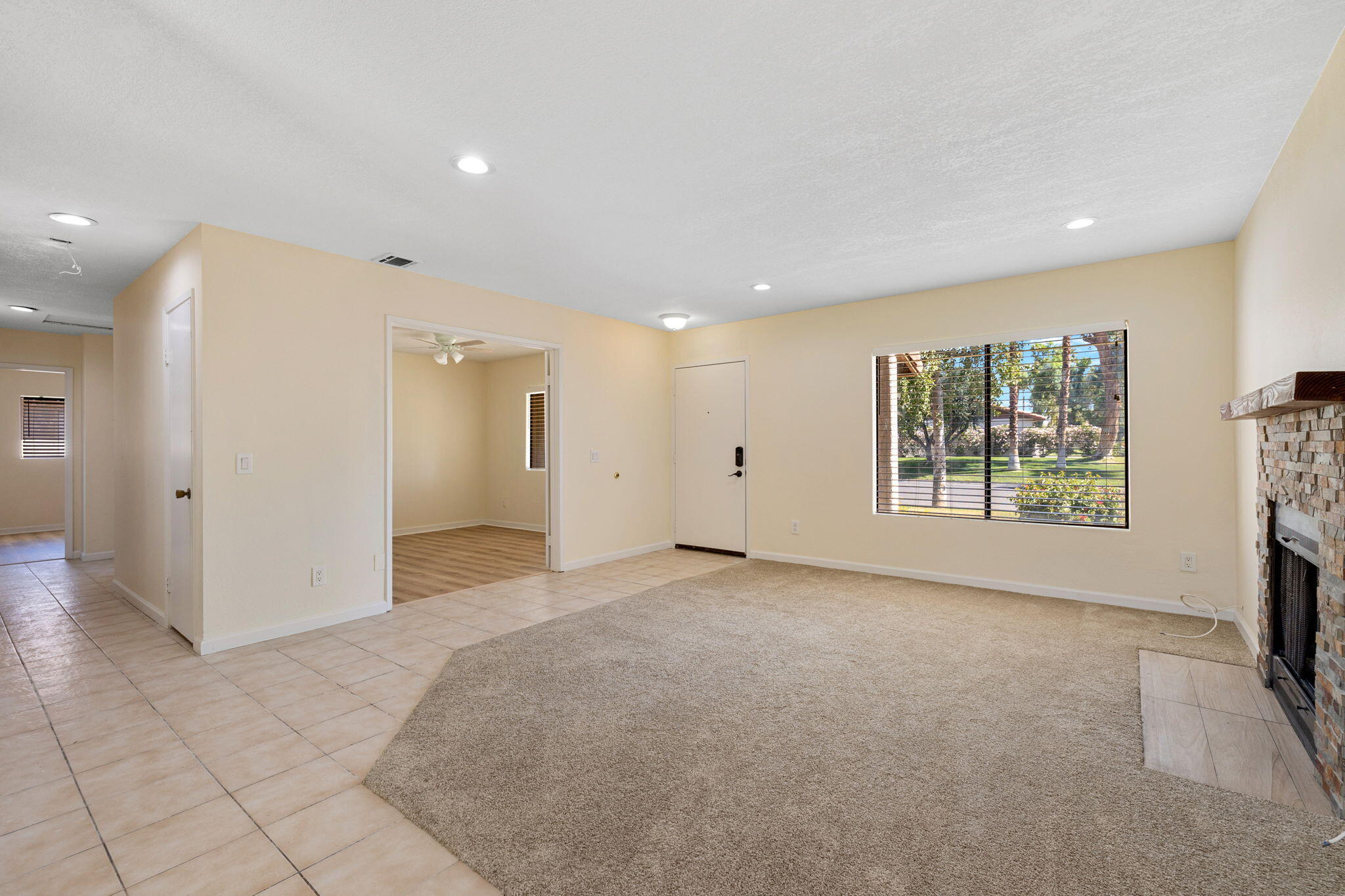 41885 Largo Palm Desert, CA 92211 - Photo 3 of 26 a view of an empty room with a window