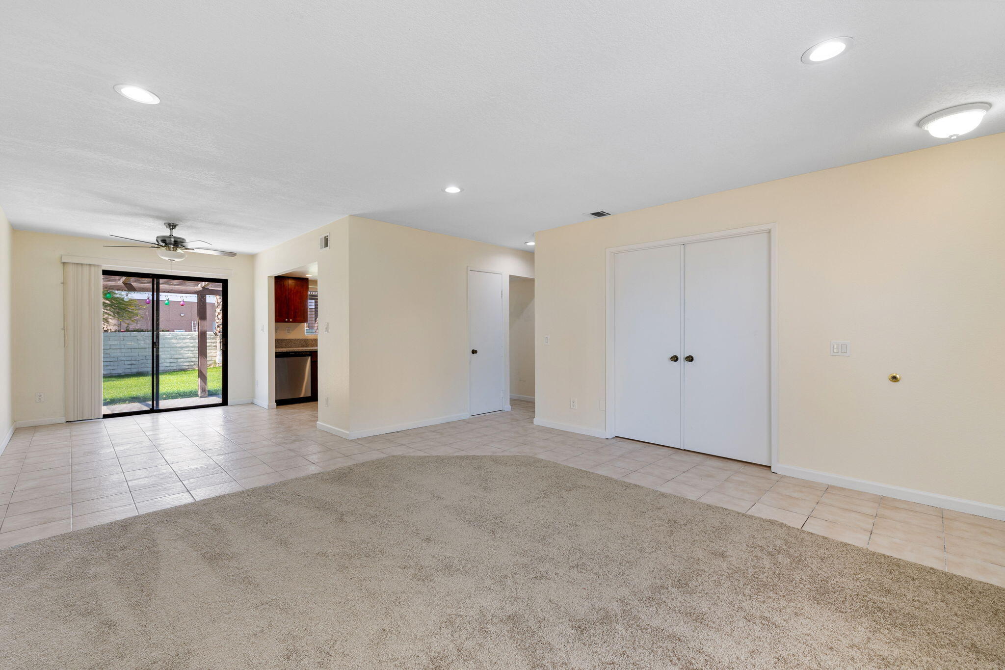 41885 Largo Palm Desert, CA 92211 - Photo 6 of 26 a view of an empty room with closet and a window