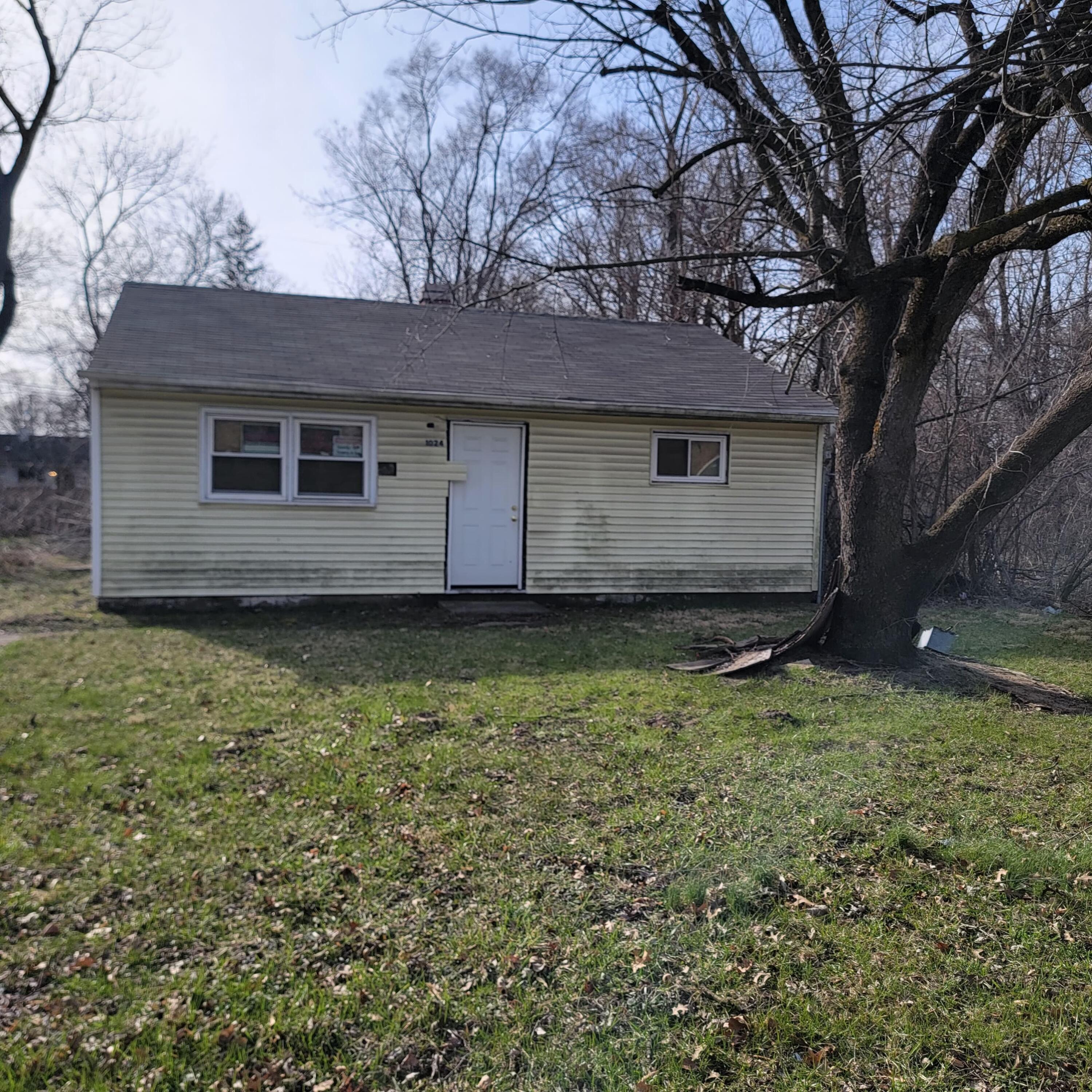 1024 Durbin Street Gary, IN 46406 - Photo 2 of 23 a house view with a backyard space