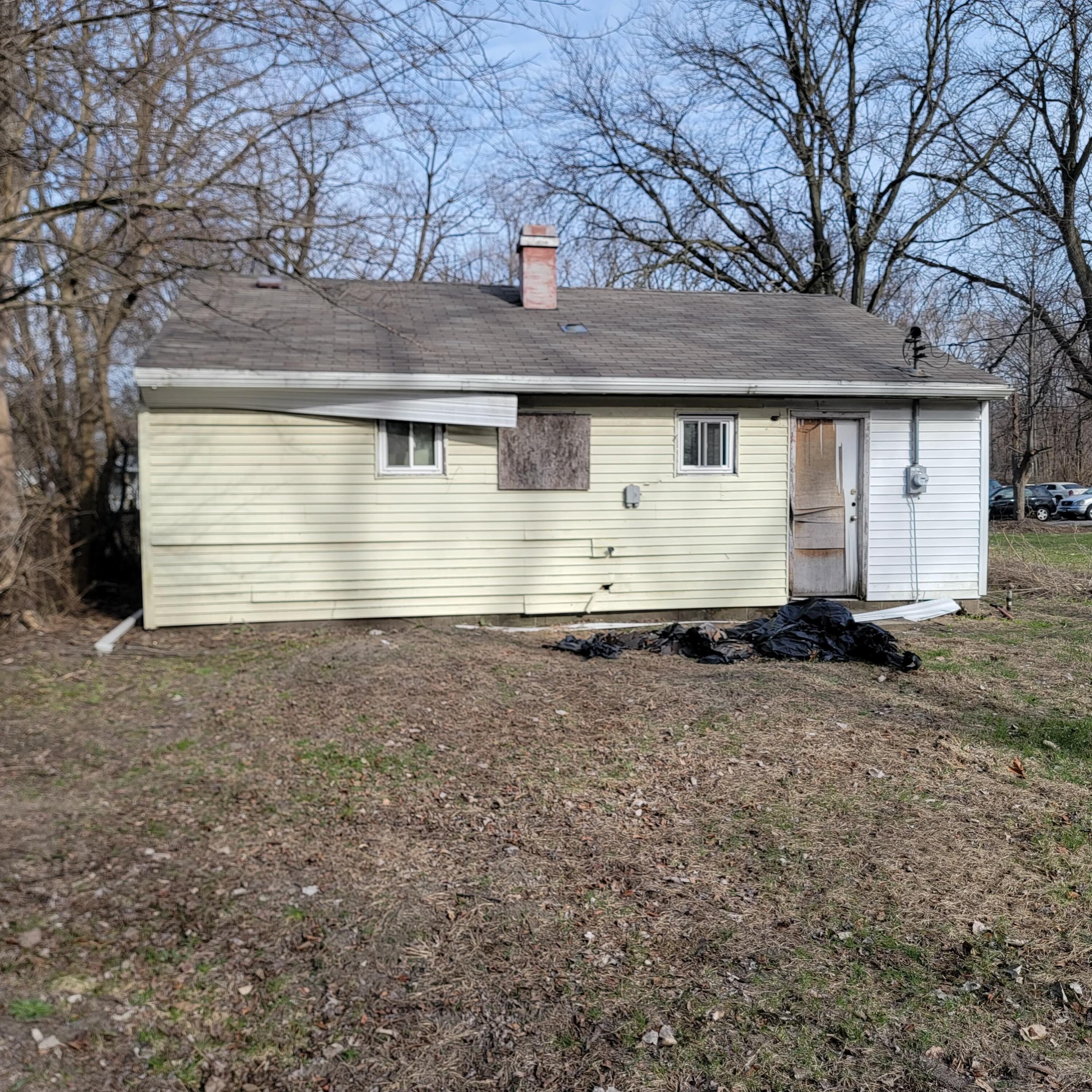 1024 Durbin Street Gary, IN 46406 - Photo 22 of 23 a front view of a house with a yard