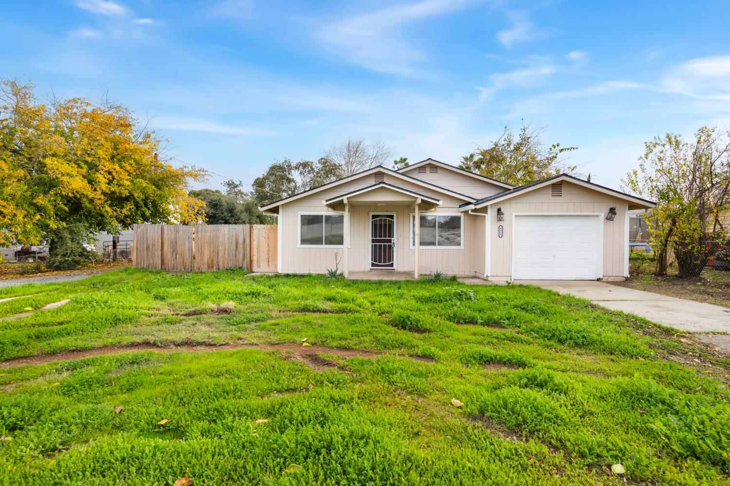 4853 Riosa Road Sheridan, CA 95681 - Photo 1 of 1 a view of a yard in front of a house with a garden