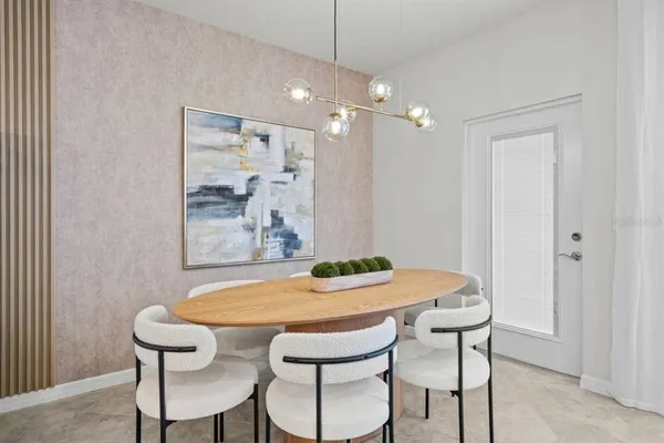 a view of a dining room with furniture