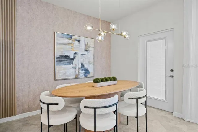 a view of a dining room with furniture