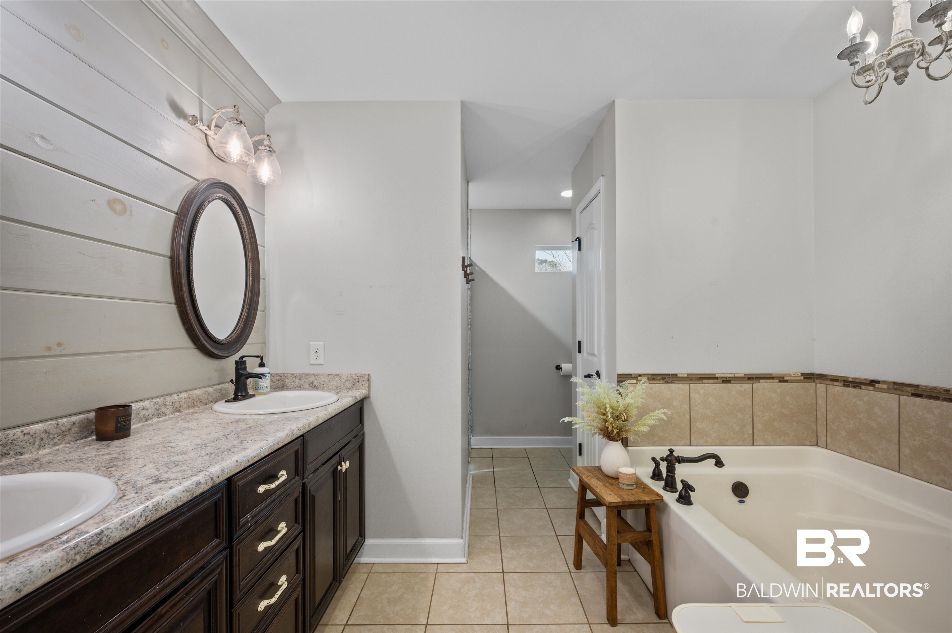 22370 Buck Road Robertsdale, AL 36567 - Photo 15 of 31 Primary Full bath featuring tile patterned flooring, a sink, double vanity, a shower and a garden tub