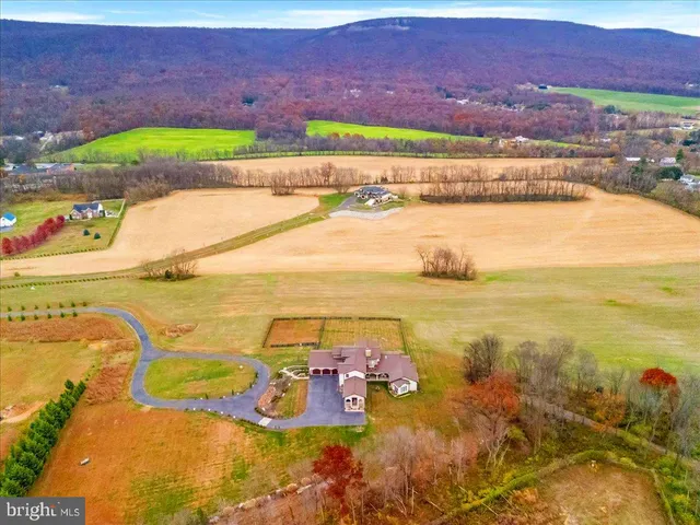 a view of an ocean and a mountain