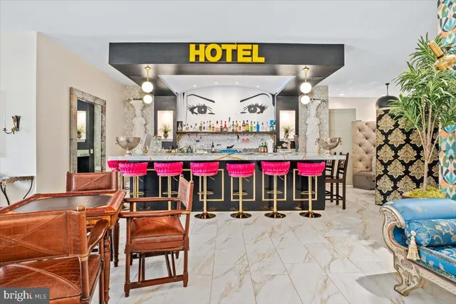 a view of a swimming pool and an outdoor seating