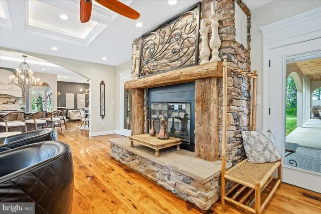 a large kitchen with stainless steel appliances granite countertop a stove and a sink