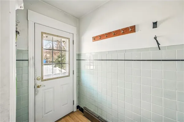 a bathroom with a window and shower
