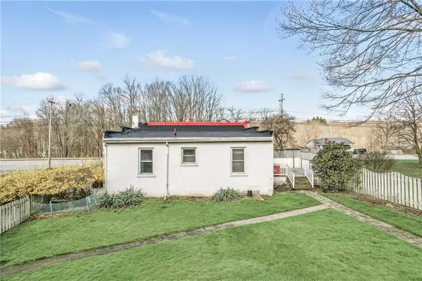 a room with a door and wooden floor