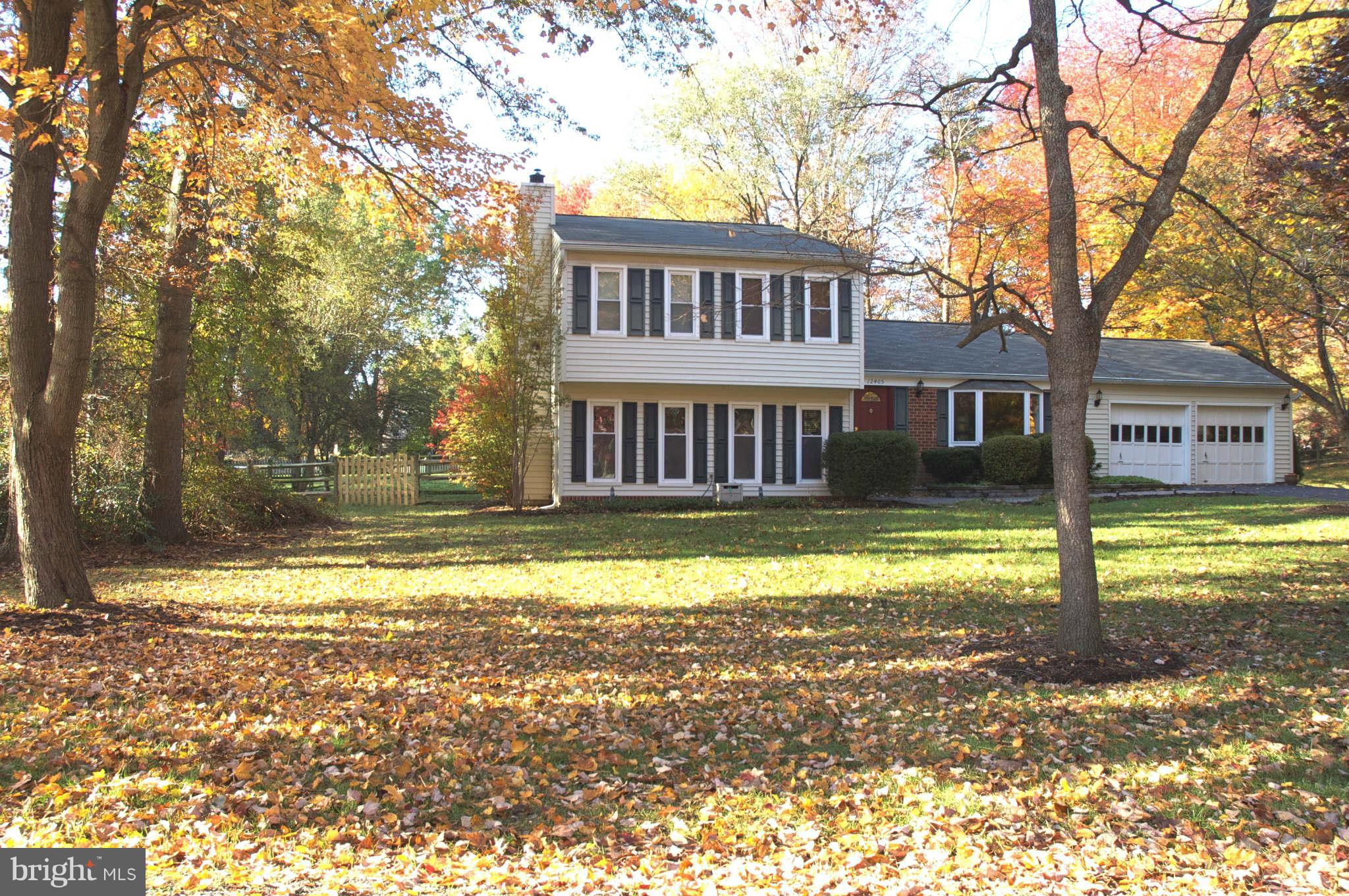 12405 Melmark Court Reston, VA 20191 - Photo 1 of 30 a view of a house with a yard