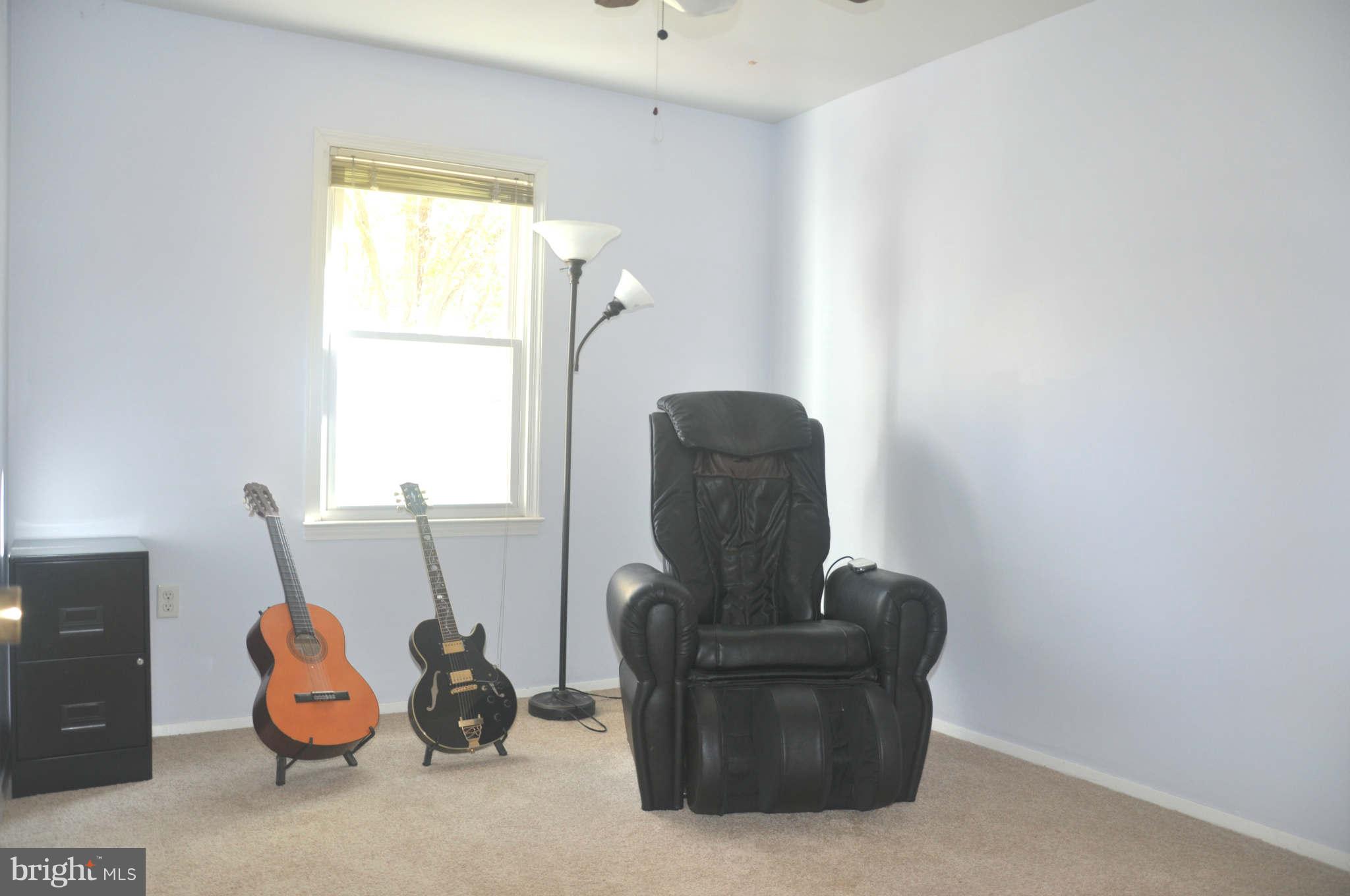 12405 Melmark Court Reston, VA 20191 - Photo 14 of 30 a living room with furniture and a window